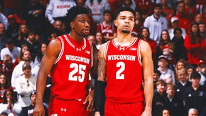 WISCONSIN BADGERS Trending Image: Wisconsin Bolsters Resume With Overtime Win at No. 8 Illinois