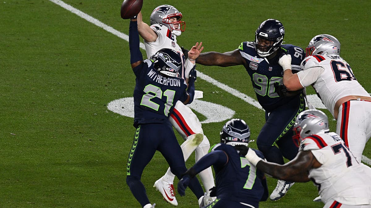 Seahawks corner Devon Witherspoon can not only cover the opponent's WR1, he was a nightmare for Patriots QB Drake Maye in the Super Bowl as a blitzer. (Photo by Focus on Sport/Getty Images)