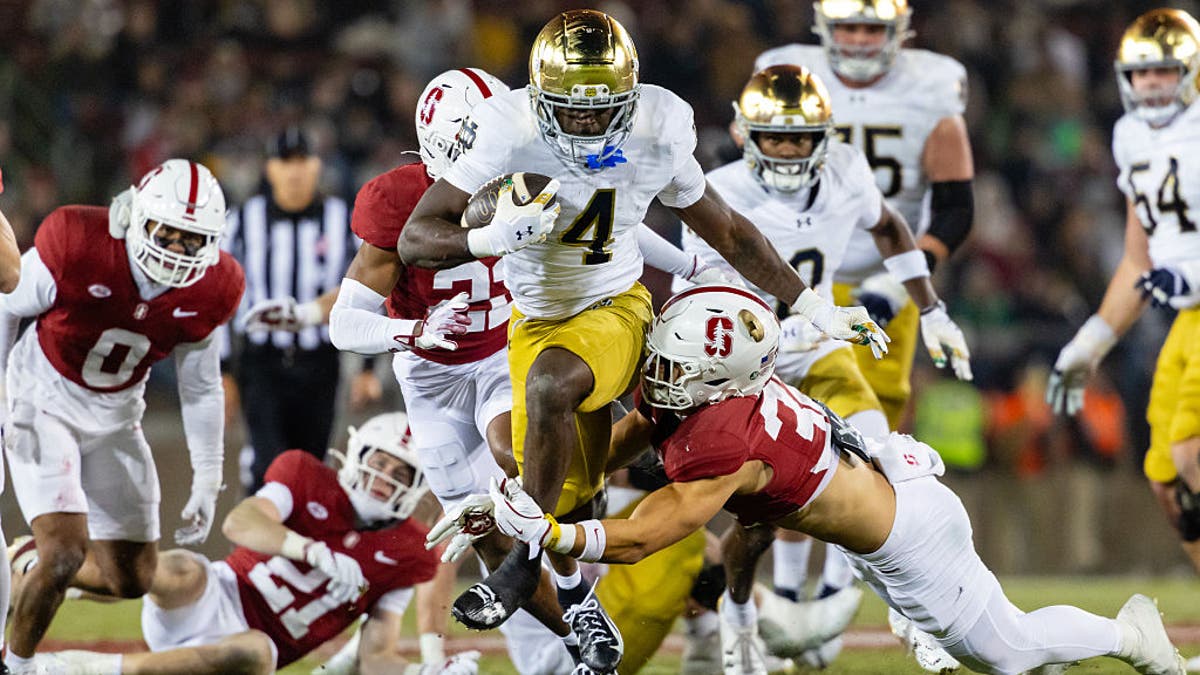 In three years at Notre Dame, Jeremiyah Love went over, around and through defenders, rushing for more than 2,800 yards. (Photo by Matthew Huang/Icon Sportswire via Getty Images)