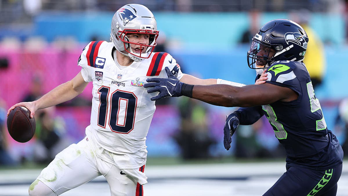 Patriots QB Drake Maye is pressured by Boye Mafe during the second quarter of Super Bowl LX in February. (Photo by Kevin C. Cox/Getty Images)