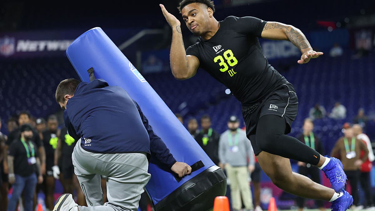 Keldric Faulk of the Auburn Tigers participates in a drill during the 2026 NFL Scouting Combine at Lucas Oil Stadium on February 26, 2026 in Indianapolis, Indiana. (Photo by Stacy Revere/Getty Images)