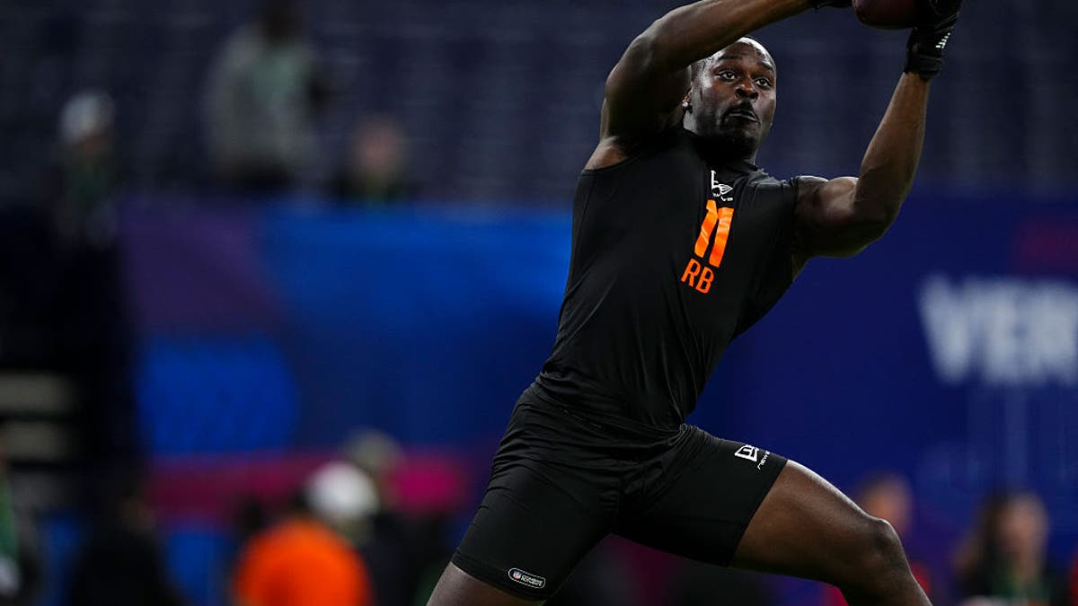 Love's pass-catching ability adds to his game, but opponents may scheme to make him pass-protect, which is not a strength. (Photo by Cooper Neill/Getty Images)