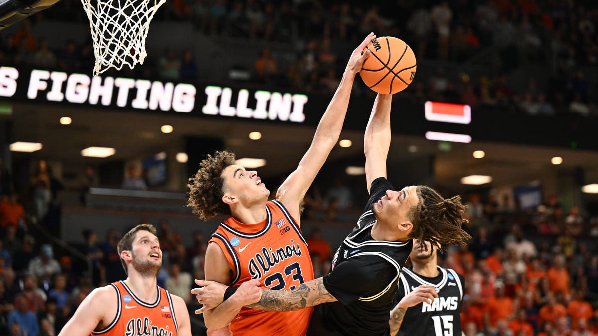 Keaton Wagler #23 of the Illinois Fighting Illini blocks the shot of Jadrian Tracey #2 of VCU. (Photo by Jamie Sabau/NCAA Photos via Getty Images)