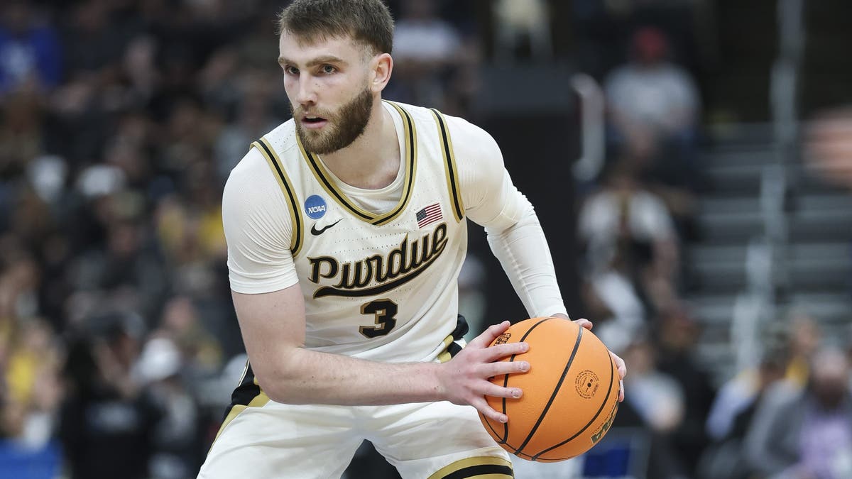 Braden Smith #3 of the Purdue Boilermakers looks to pass the ball during the first half against Queens University. (Photo by Jamie Squire/Getty Images)