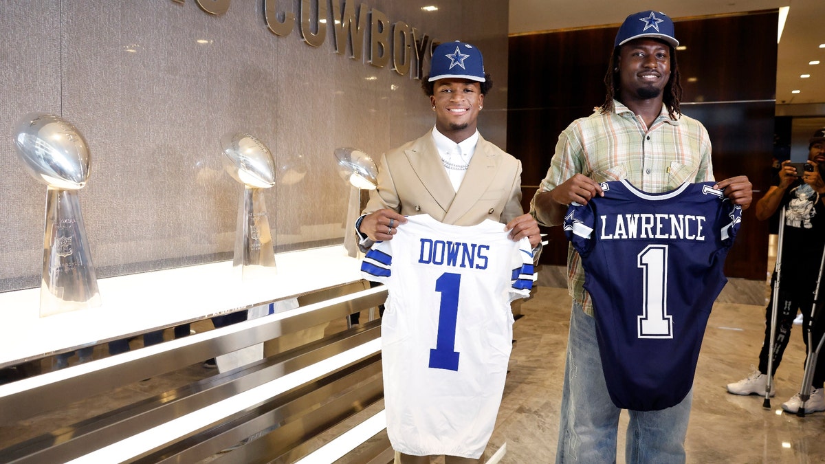 Dallas Cowboys first-round rookies Caleb Downs (left) and Malachi Lawrence pose at the team's practice facility. (Tom Fox/The Dallas Morning News via Getty Images)