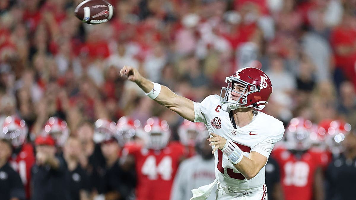 In a 24-21 upset over No. 5 Georgia last September on the road, Ty Simpson threw for 276 yards and two touchdowns and ran for a third TD. (Photo by Kevin C. Cox/Getty Images)