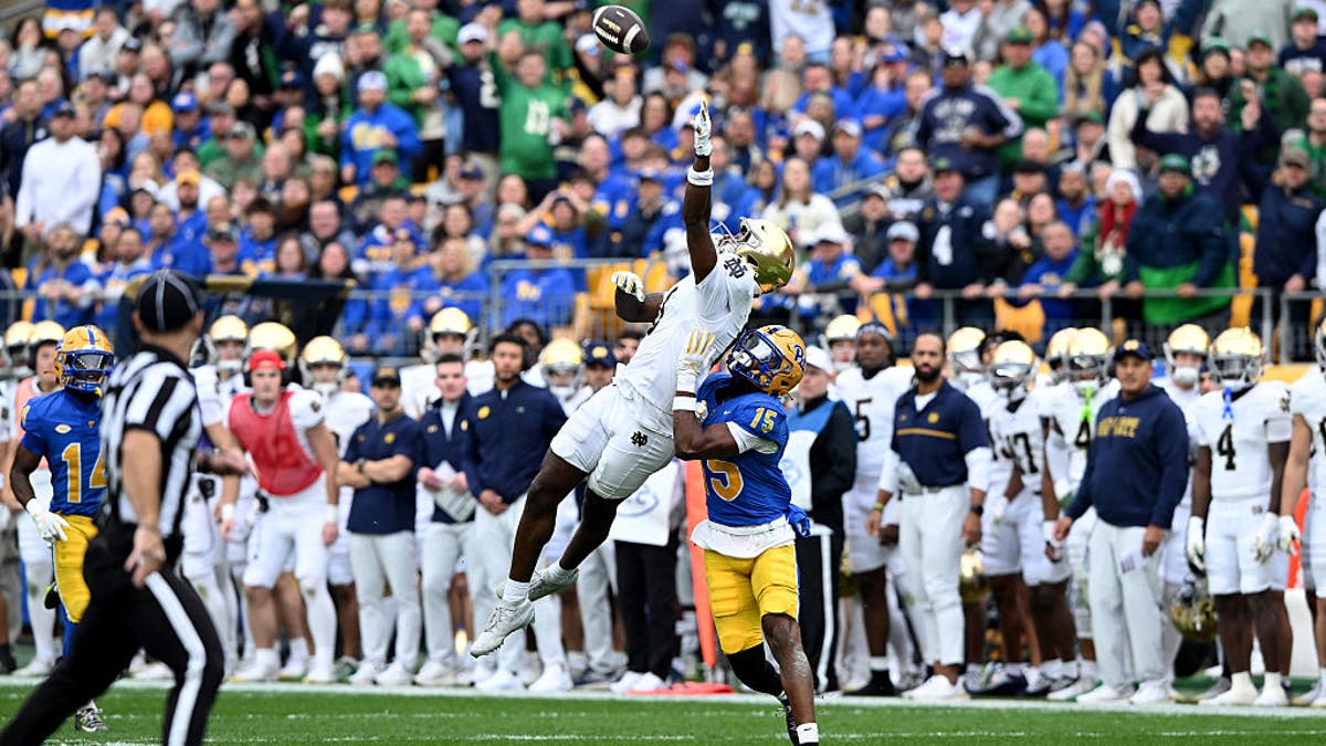 The 6-foot-4 Malachi Fields can go up and get the ball, as Pittsburgh CB Rashad Battle found out last November. (Photo by G Fiume/Getty Images)