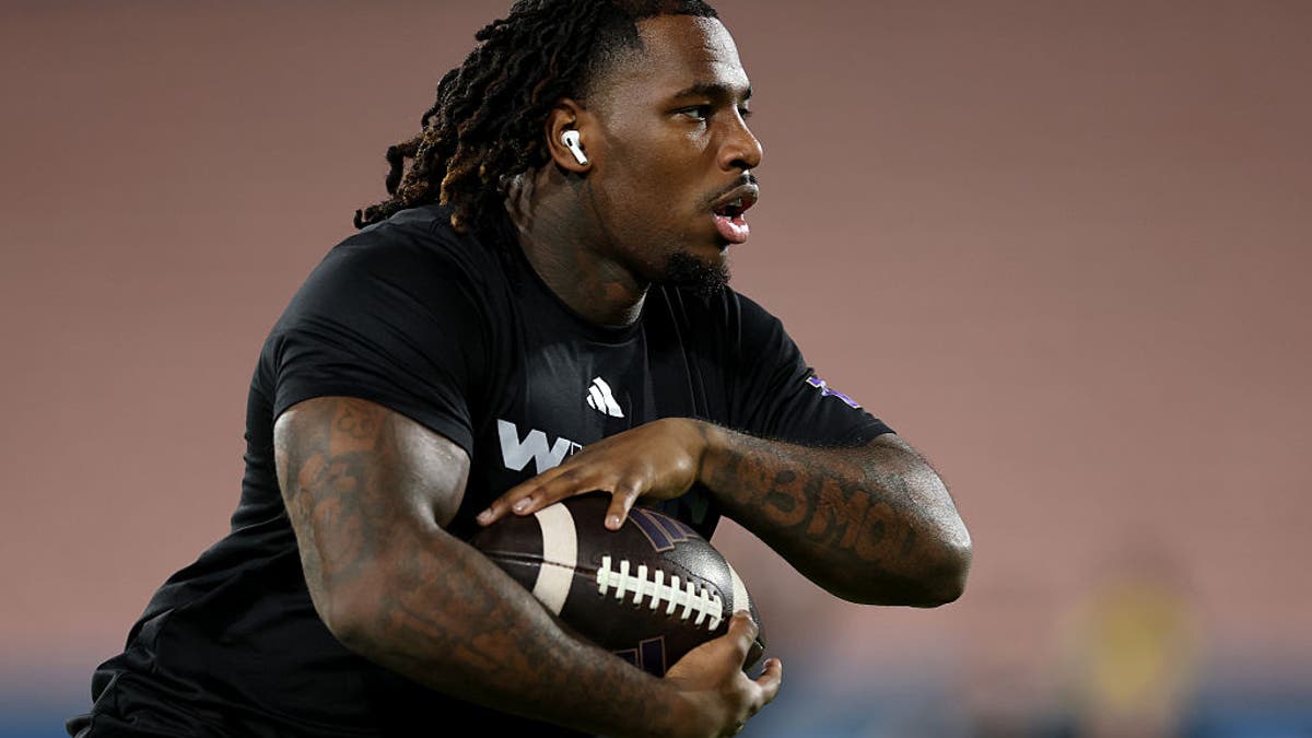 Jonah Coleman #1 of the Washington Huskies warms up before the game against the UCLA Bruins at Rose Bowl Stadium on November 22, 2025 in Pasadena, California. (Photo by Luke Hales/Getty Images)