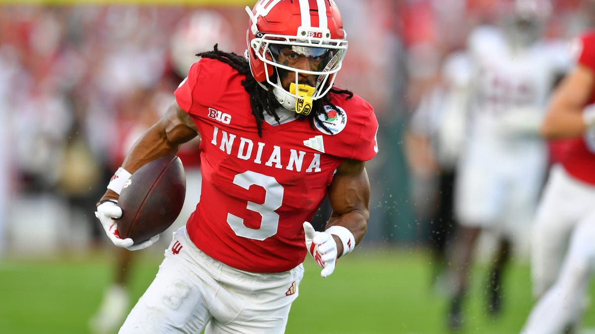 Omar Cooper Jr. emerged as a top receiver in the country this past season while catching passes from Fernando Mendoza. (Photo by Brian Rothmuller/Icon Sportswire via Getty Images)