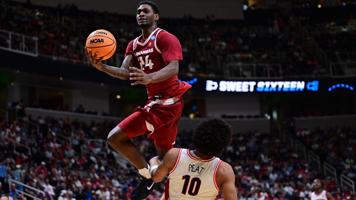 Billy Richmond III drives to the basket against the Arizona Wildcats during the 2026 NCAA Men's Basketball Tournament. (Photo by Ben Solomon/NCAA Photos via Getty Images)