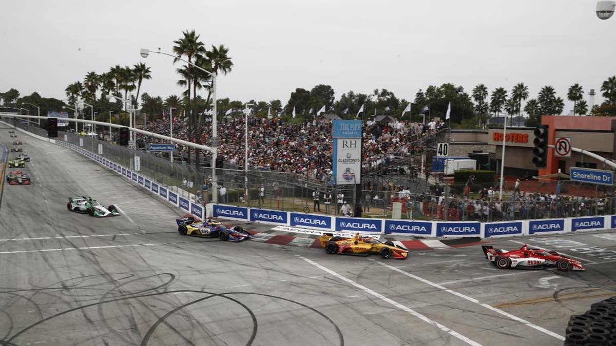 INDYCAR drivers navigate Turn 1 at the Grand Prix of Long Beach. (Chris Jones, Penske Entertainment/INDYCAR)