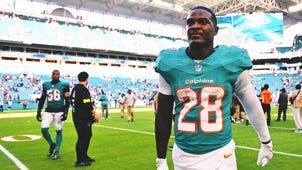 DETROIT LIONS Trending Image: 2026 NFL Offseason Buzz: Star RB De'Von Achane Absent at Start of Dolphins Workouts