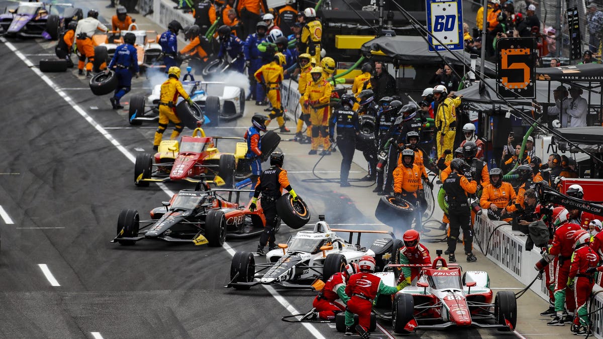 Drivers and their teams during a pit stop at the 2025 Indianapolis 500.  (Photo by Phillip G. Abbott/Lumen via Getty Images)