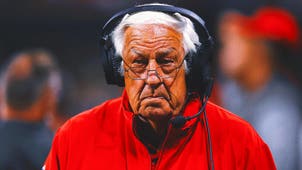 COLLEGE FOOTBALL Trending Image: College Football Offseason Buzz: Tom Moore Returns to Iowa as Senior Consultant