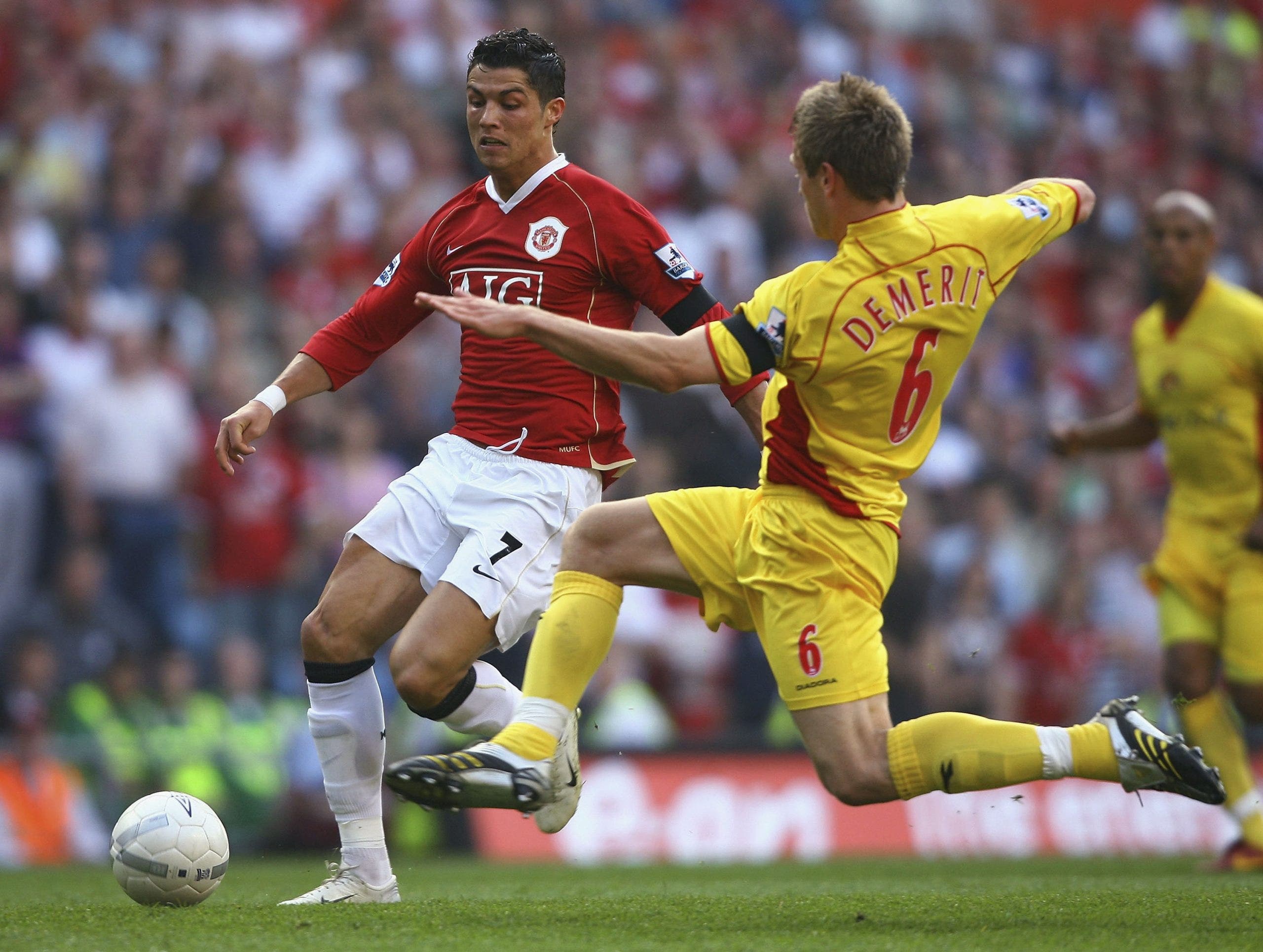 Cristiano Ronaldo anticipates a tackle from Jay Demerit during a 2007 FA Cup semifinal. (Stu Forster/Getty Images)