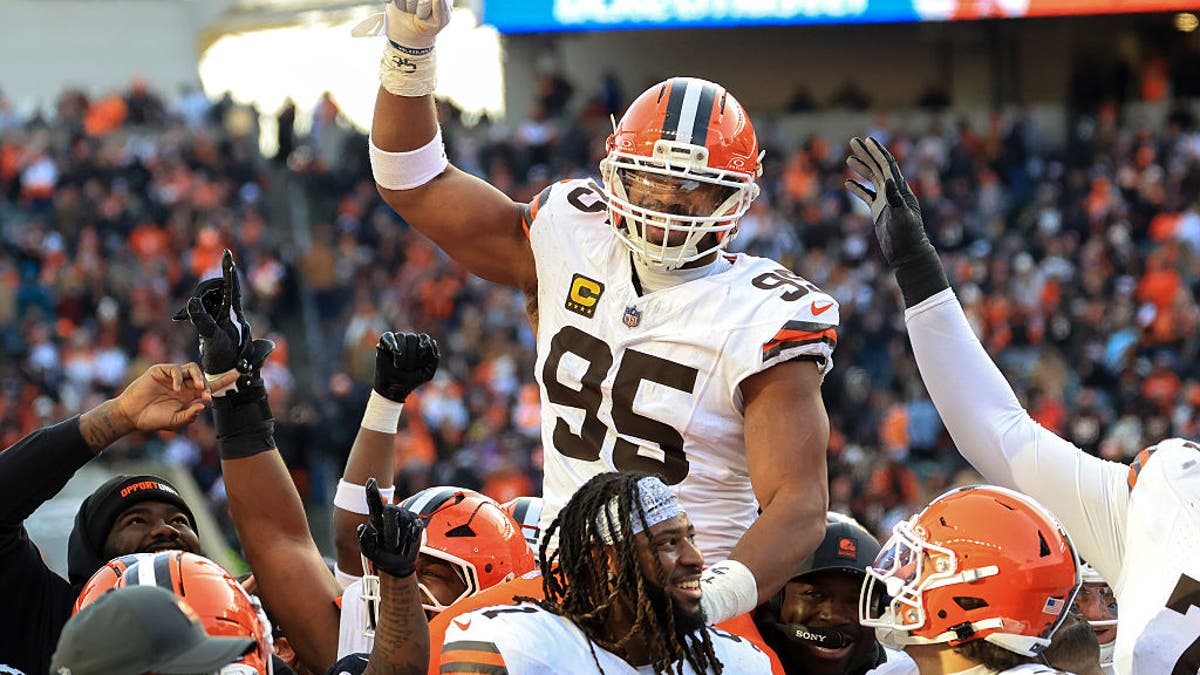 Myles Garrett #95 of the Cleveland Browns celebrates after breaking the NFL single-season sack record during the game against the Cincinnati Bengals at Paycor Stadium on January 04, 2026 in Cincinnati, Ohio. (Photo by Justin Casterline/Getty Images)