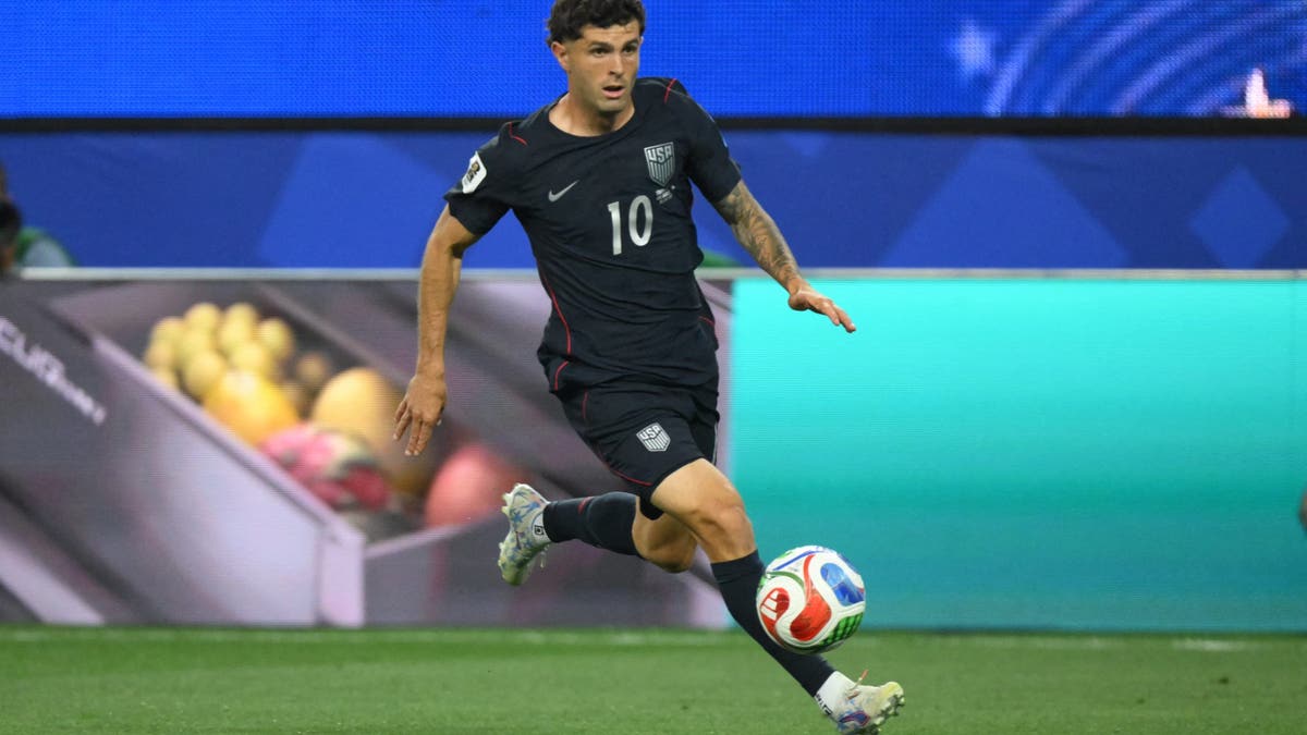 Christian Pulisic took the field in the 58th minute of the USA's loss to Türkiye after suffering a calf injury in the team's World Cup opener against Paraguay. (Photo by Patrick T. FALLON / AFP via Getty Images)