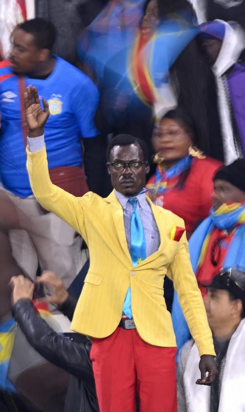 Why Does 'Lumumba Vea,' DR Congo's 'Statue Man,' Stand The Whole Match?