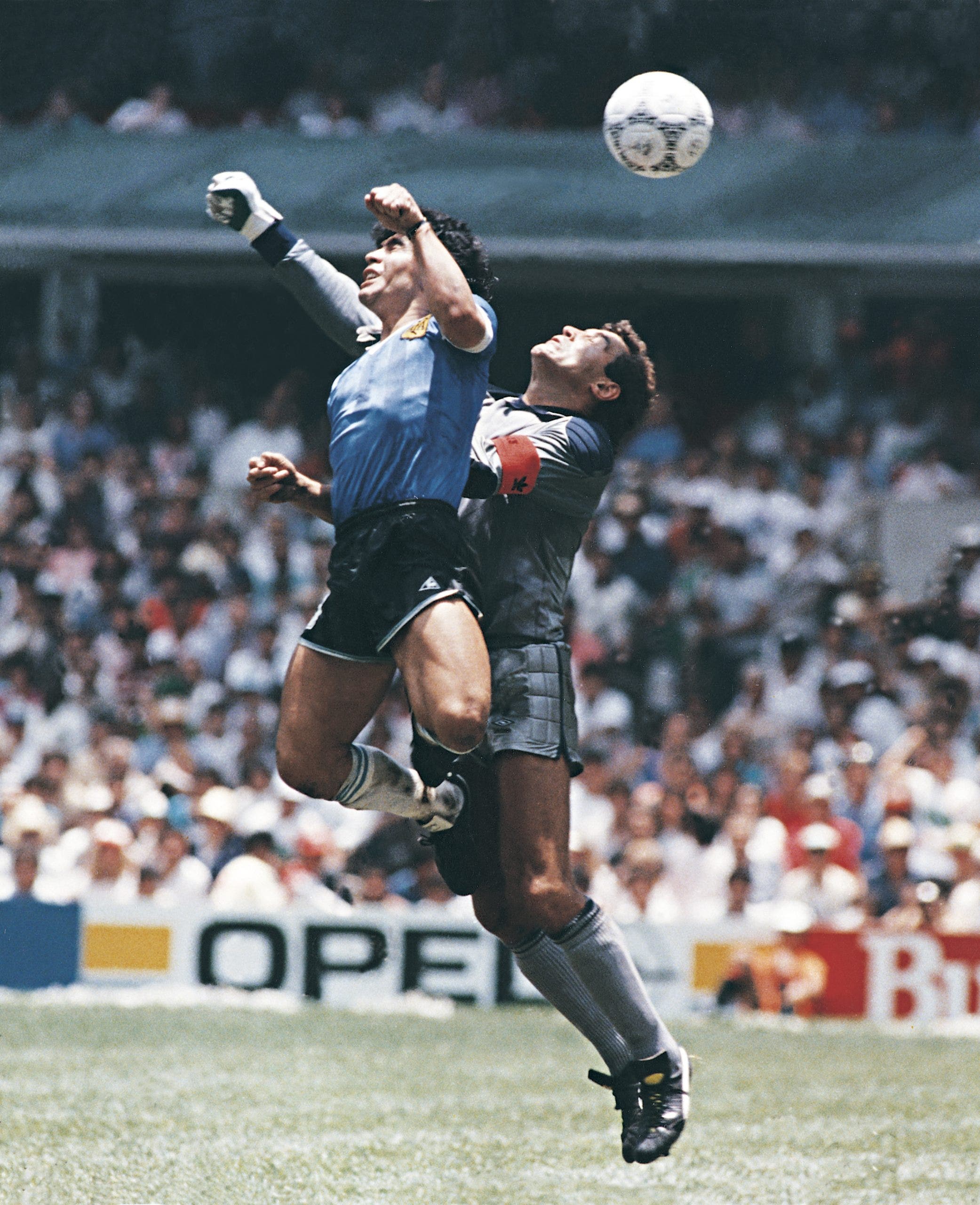Diego Maradona scored two iconic goals in a span of four minutes to eliminate England from the 1986 quarterfinals. Maradona later claimed that this goal was scored by 'The Hand Of God'. (Photo by Archivo El Grafico/Getty Images)