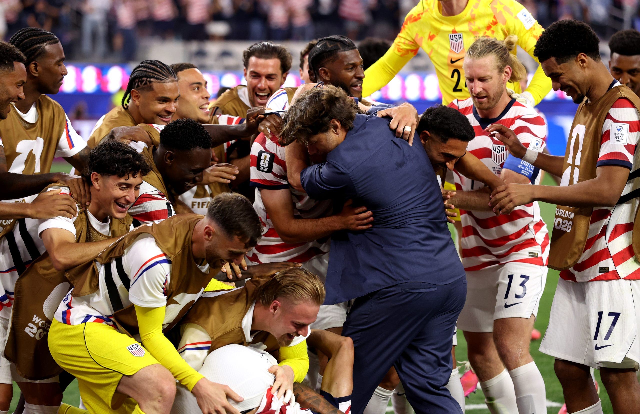 Mauricio Pochettino celebrates with USA players after beating Paraguay in the 2026 World Cup group stage. (Photo by Alex Livesey - FIFA/FIFA via Getty Images)