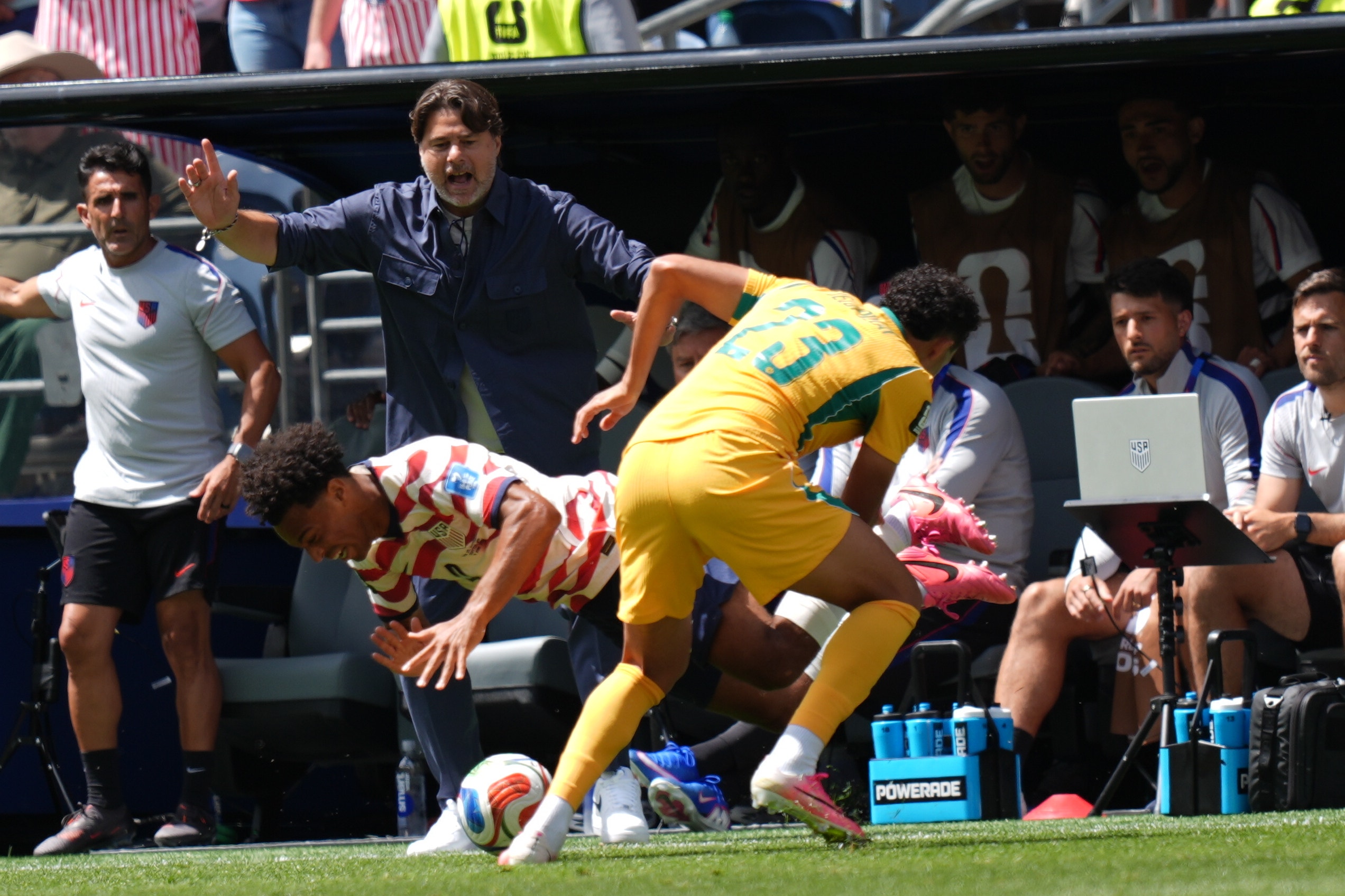 Tyler Adams and Nishan Velupillay make contact during the USA-Australia match in the World Cup group stage. (Photo by Ercin Erturk/Anadolu via Getty Images)