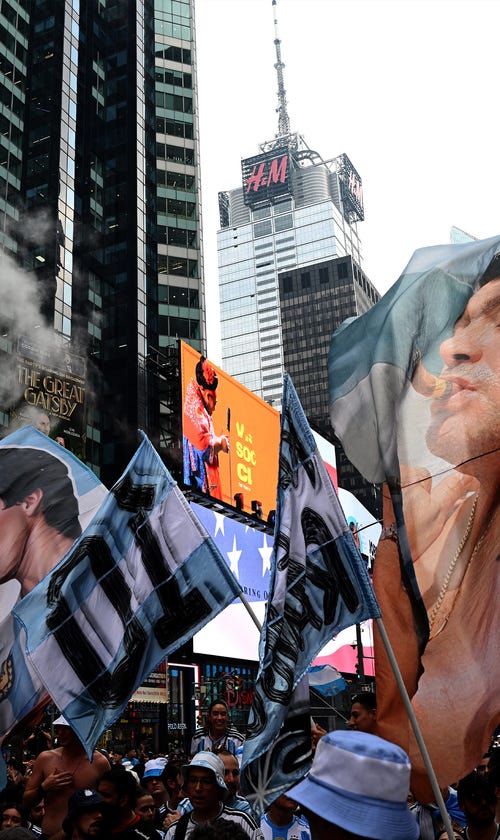 Argentina Fans Party Throughout The Night In Times Square Before World Cup Final