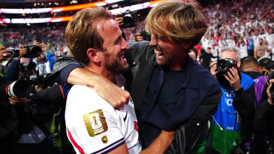 Harry Kane Presents England Legacy Cap To Peter Crouch During Three Lions Camp Visit