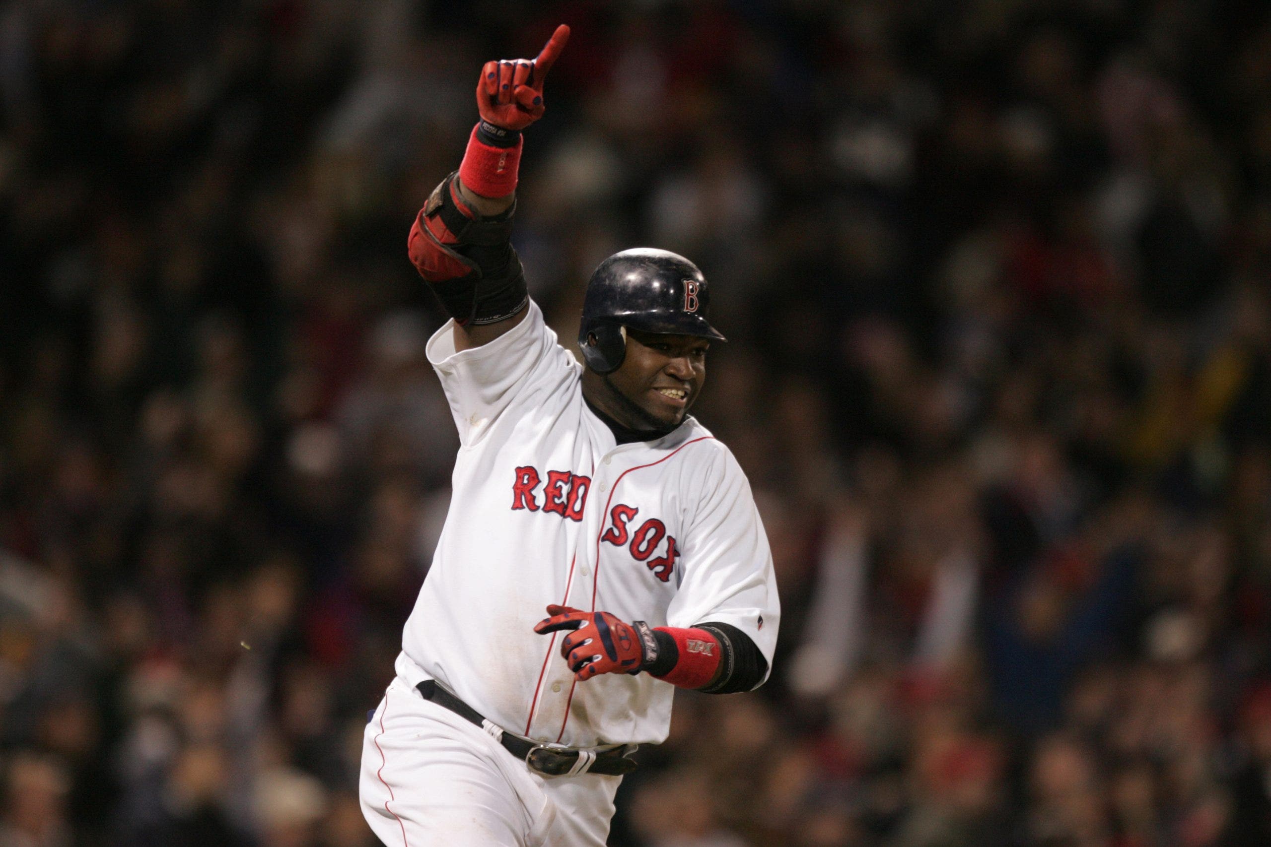 David Ortiz celebrates after his walk-off single in the 14th inning of Game 5 of the 2004 ALCS. His Red Sox remain the only team in MLB history to rally from a 3-0 series deficit. (Photo by Damian Strohmeyer /Sports Illustrated via Getty Images)